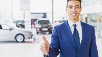 portrait-salesman-car-dealership